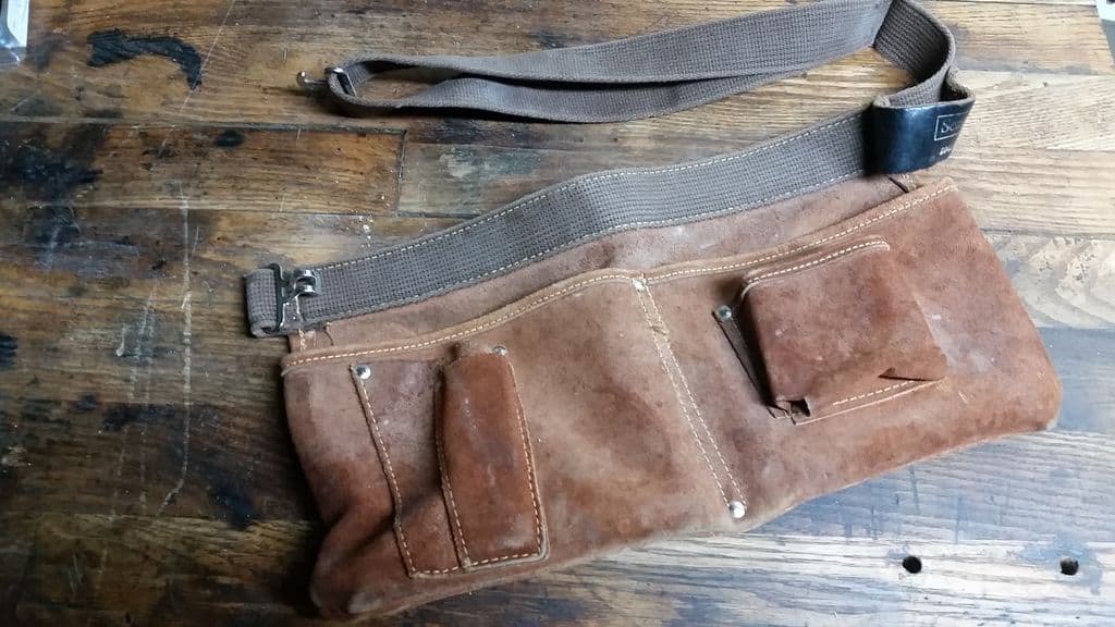 A multi-pocketed tool belt camping